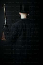 Victorian man wearing a top hat and holding a gun (Luke 5287)